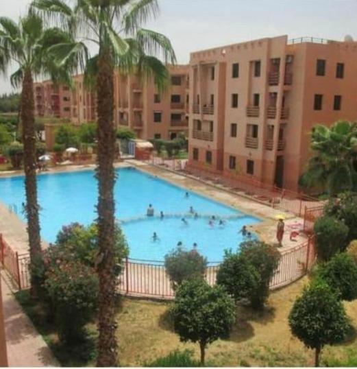 マラケシュCharmant Logement Avec Parking Residenciel Sans Piscineアパートメント エクステリア 写真